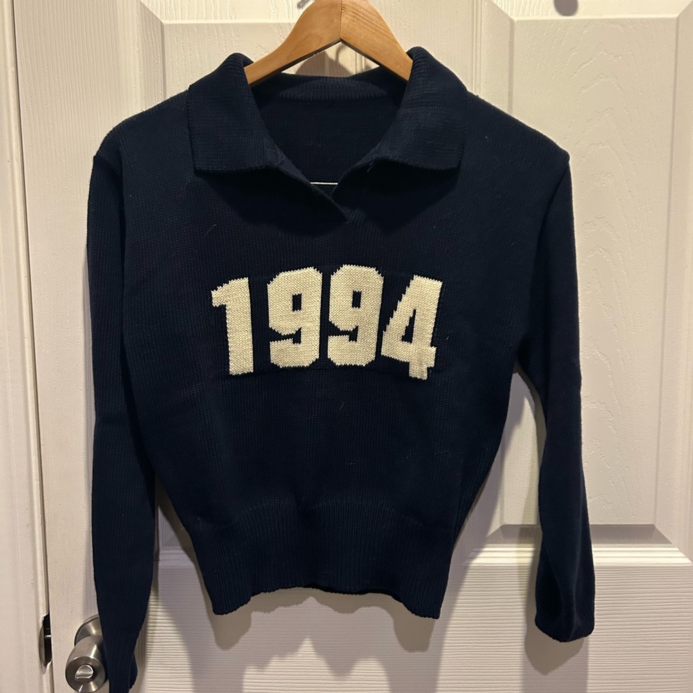 Classic Navy V-Neck Sweater with '1994' Design
